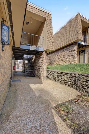 a view of entryway with stairs