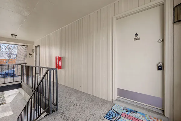 a view of room with an empty space and a window