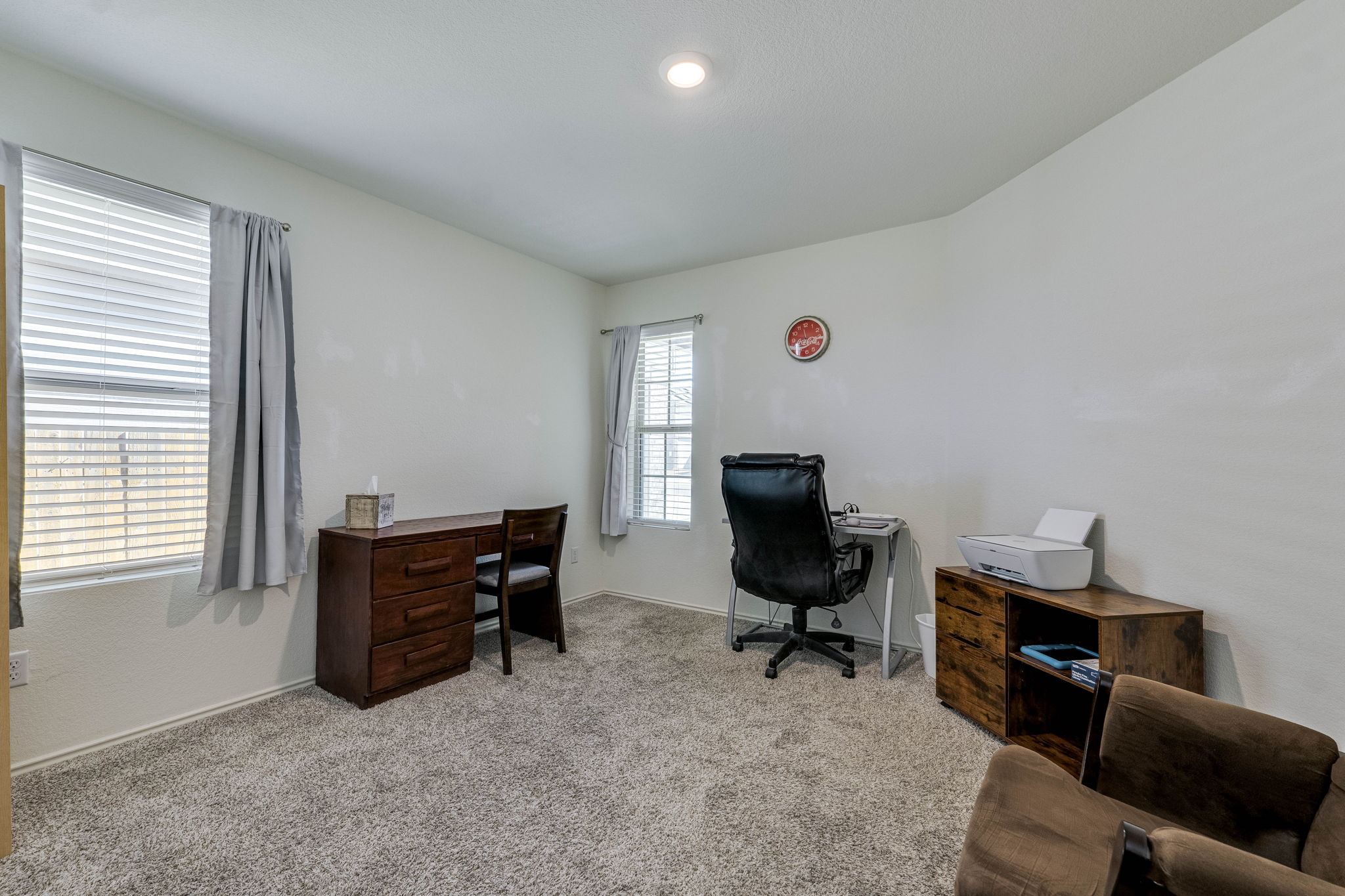 557 Greatest Gift Way Jarrell, TX 76537 - Photo 19 of 39 Office area featuring light carpet and baseboards