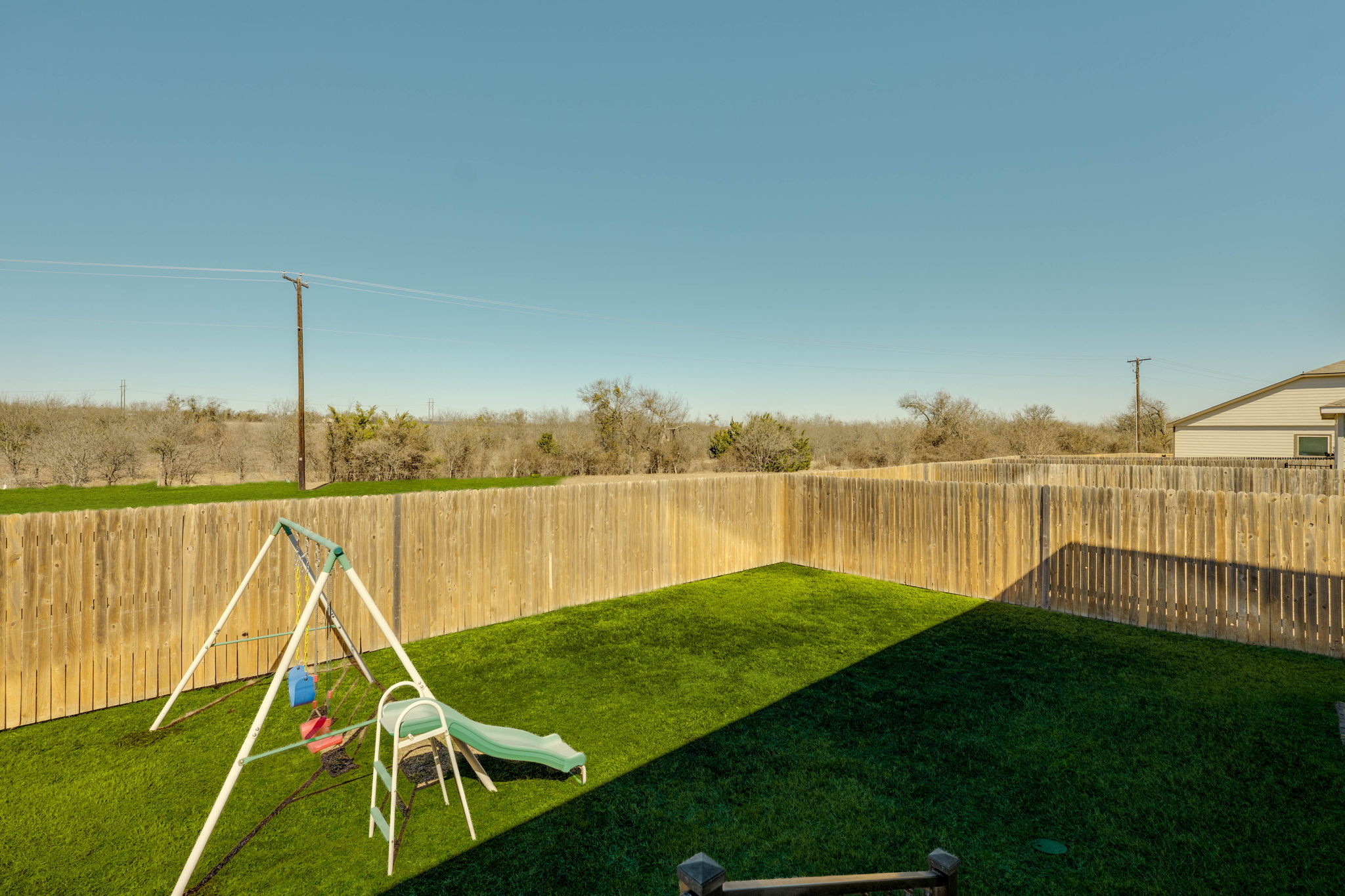 557 Greatest Gift Way Jarrell, TX 76537 - Photo 32 of 39 View of fenced backyard