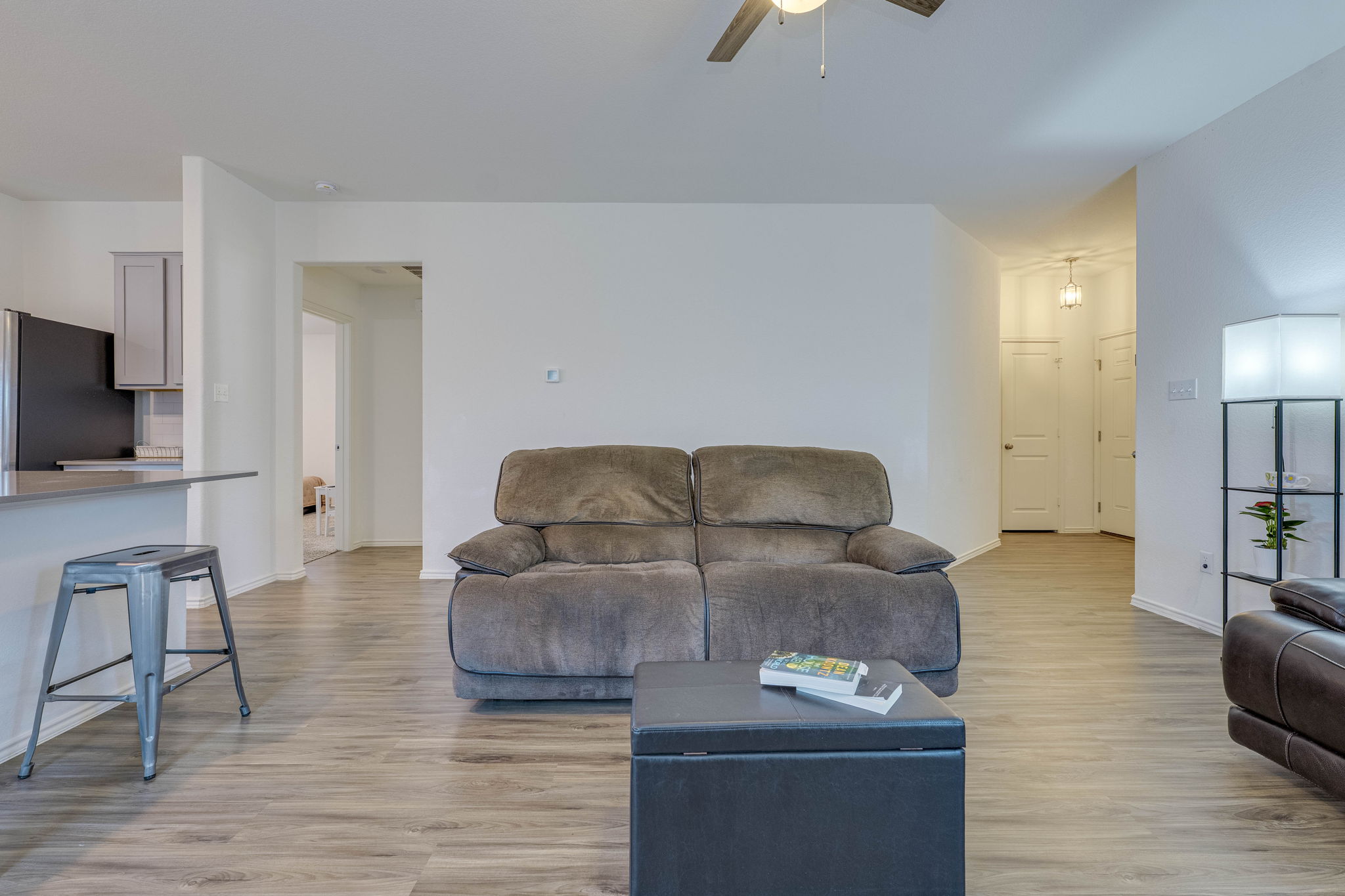 557 Greatest Gift Way Jarrell, TX 76537 - Photo 7 of 39 Living area featuring light wood-style floors and ceiling fan