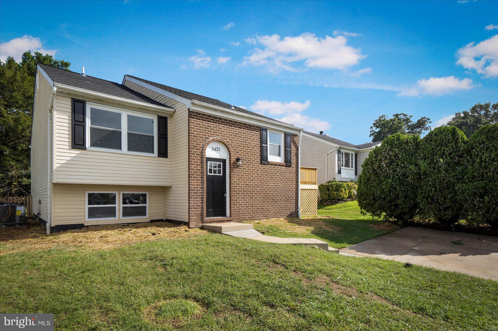 5425 Balistan Road Rosedale, MD 21237 - Photo 1 of 39 a front view of a house with a yard