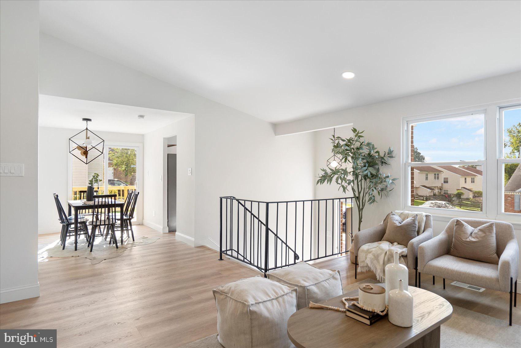 5425 Balistan Road Rosedale, MD 21237 - Photo 12 of 39 a living room with furniture and wooden floor