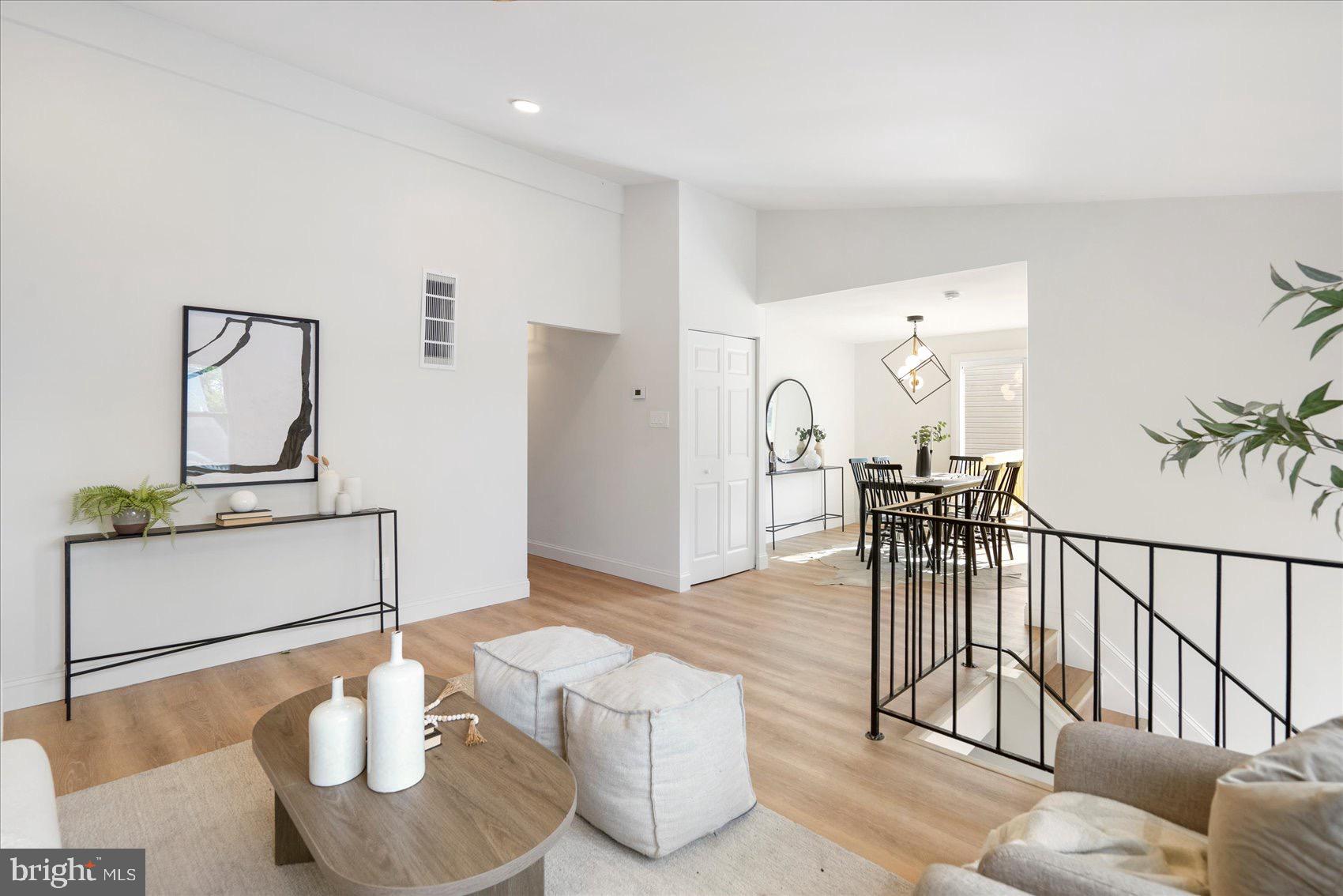 5425 Balistan Road Rosedale, MD 21237 - Photo 13 of 39 a living room with furniture and wooden floor