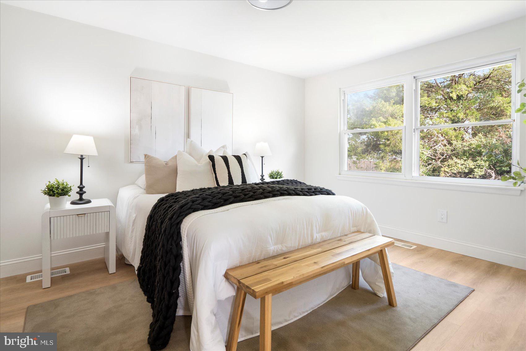 5425 Balistan Road Rosedale, MD 21237 - Photo 21 of 39 a bedroom with a bed and a window