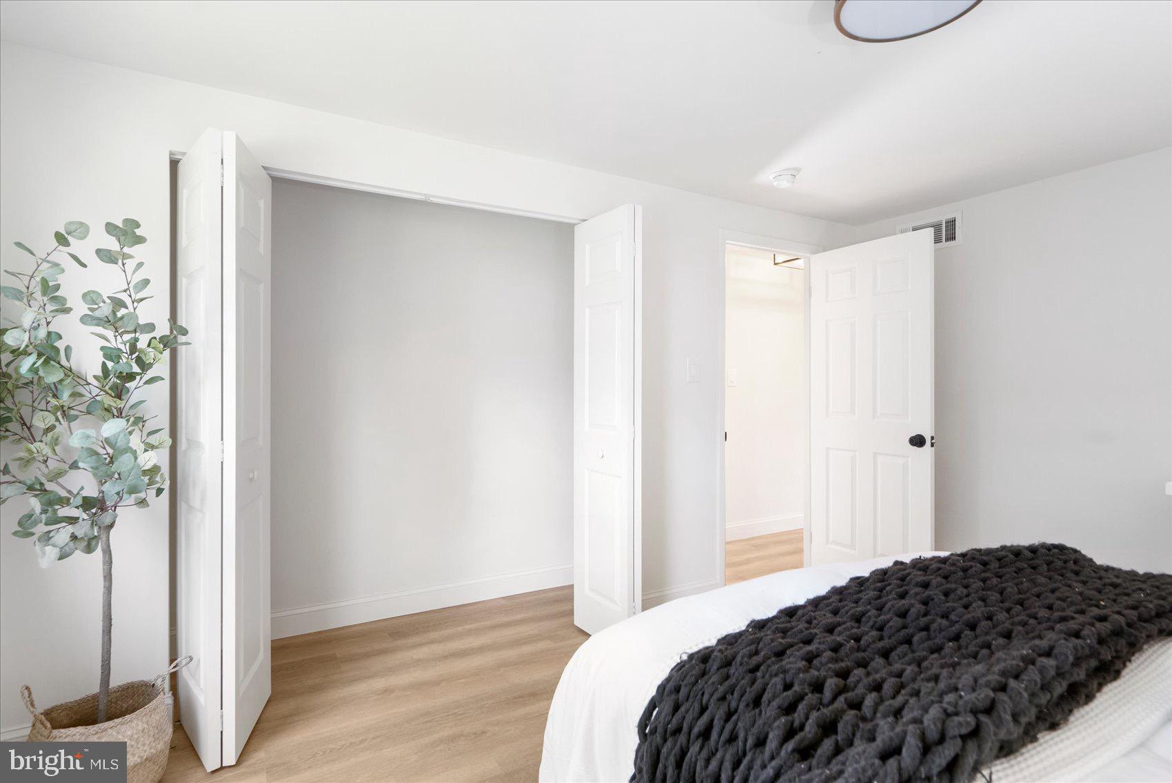 5425 Balistan Road Rosedale, MD 21237 - Photo 23 of 39 a bedroom with a bed and a window