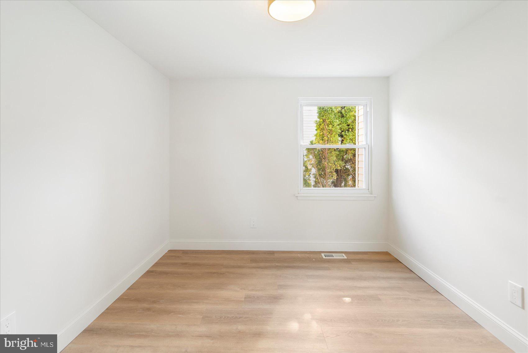 5425 Balistan Road Rosedale, MD 21237 - Photo 25 of 39 an empty room with a window