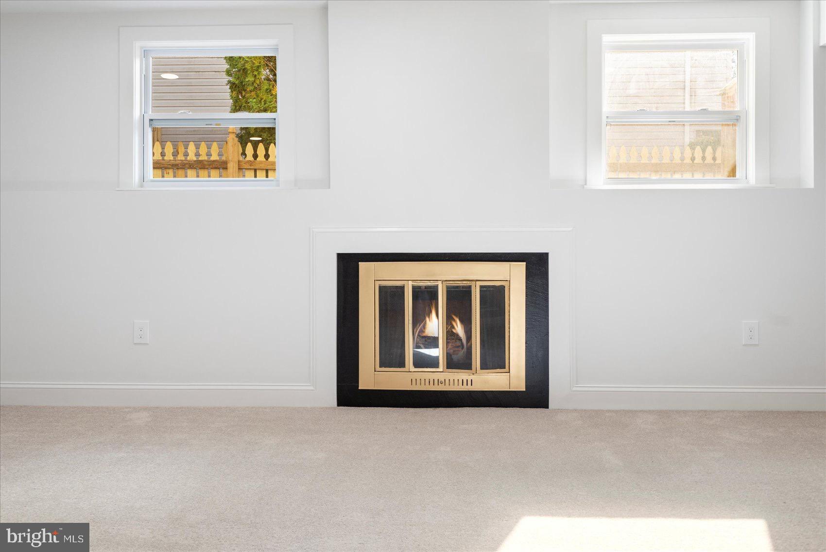 5425 Balistan Road Rosedale, MD 21237 - Photo 33 of 39 an empty room with windows and entrance