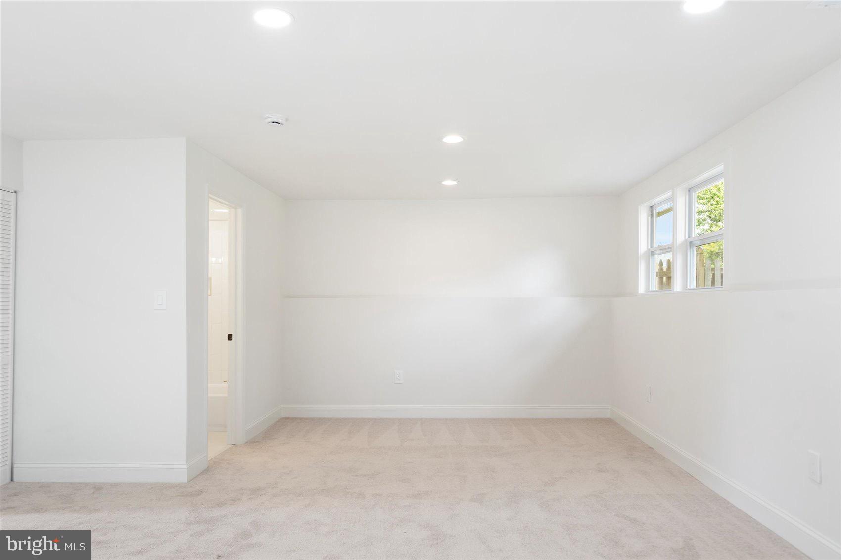 5425 Balistan Road Rosedale, MD 21237 - Photo 35 of 39 an empty room with a window