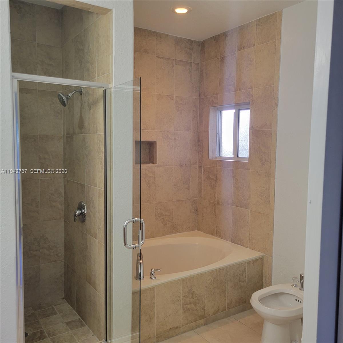 13383 Southwest 270th Street Homestead, FL 33032 - Photo 12 of 14 a bathroom with a shower and a toilet