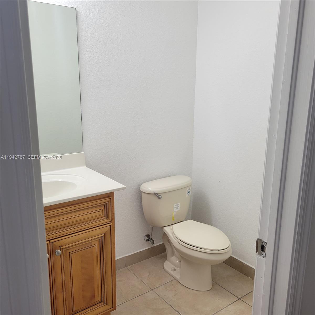 13383 Southwest 270th Street Homestead, FL 33032 - Photo 13 of 14 a white toilet sitting next to a shower