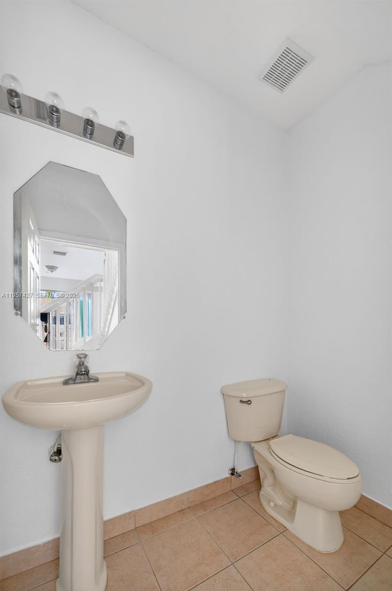 12430 Southwest 124th Terrace Miami, FL 33186 - Photo 14 of 38 Half Bathroom