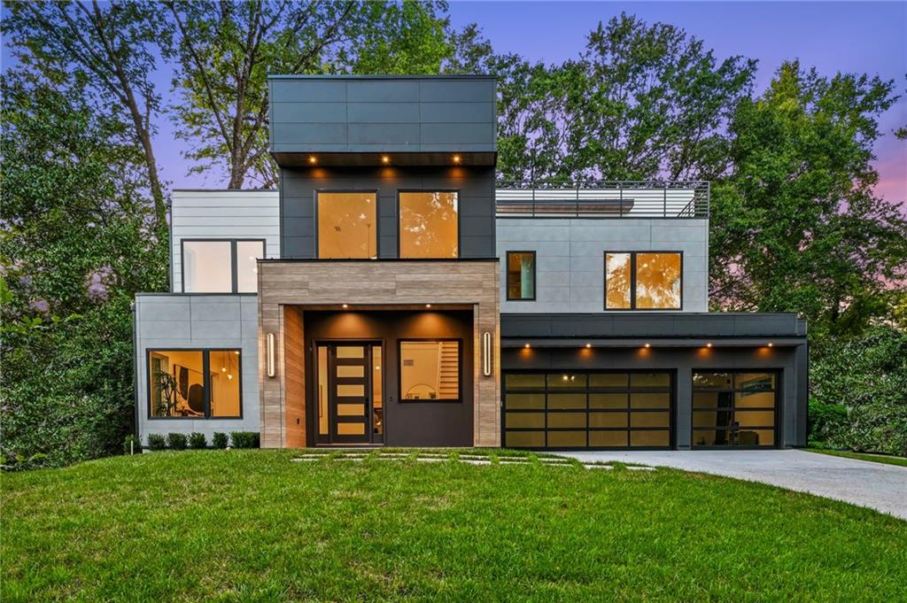 front view of a house with a yard