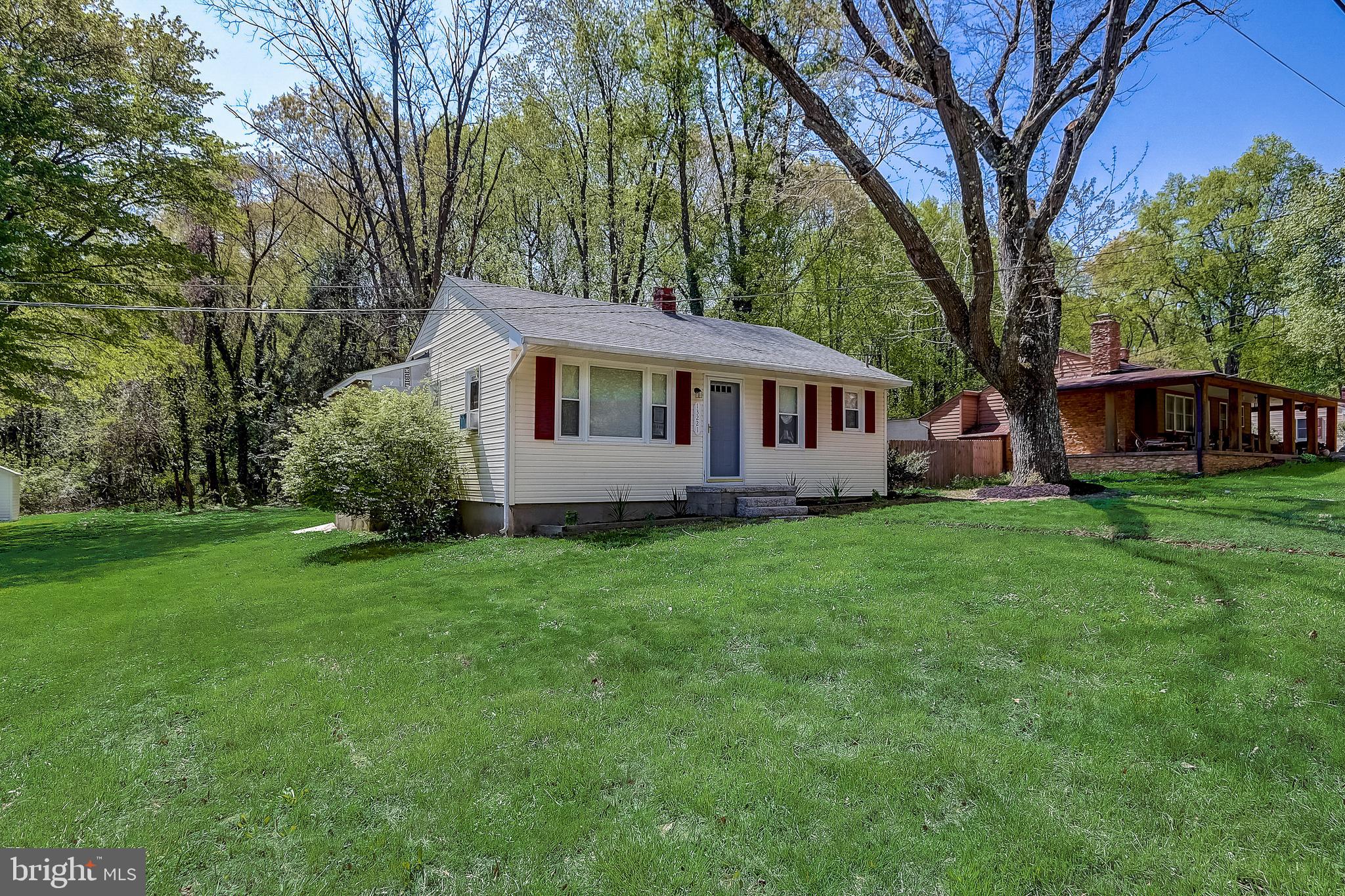 13221 Pine Road Bowie, MD 20720 - Photo 2 of 34 a view of a house with backyard and garden