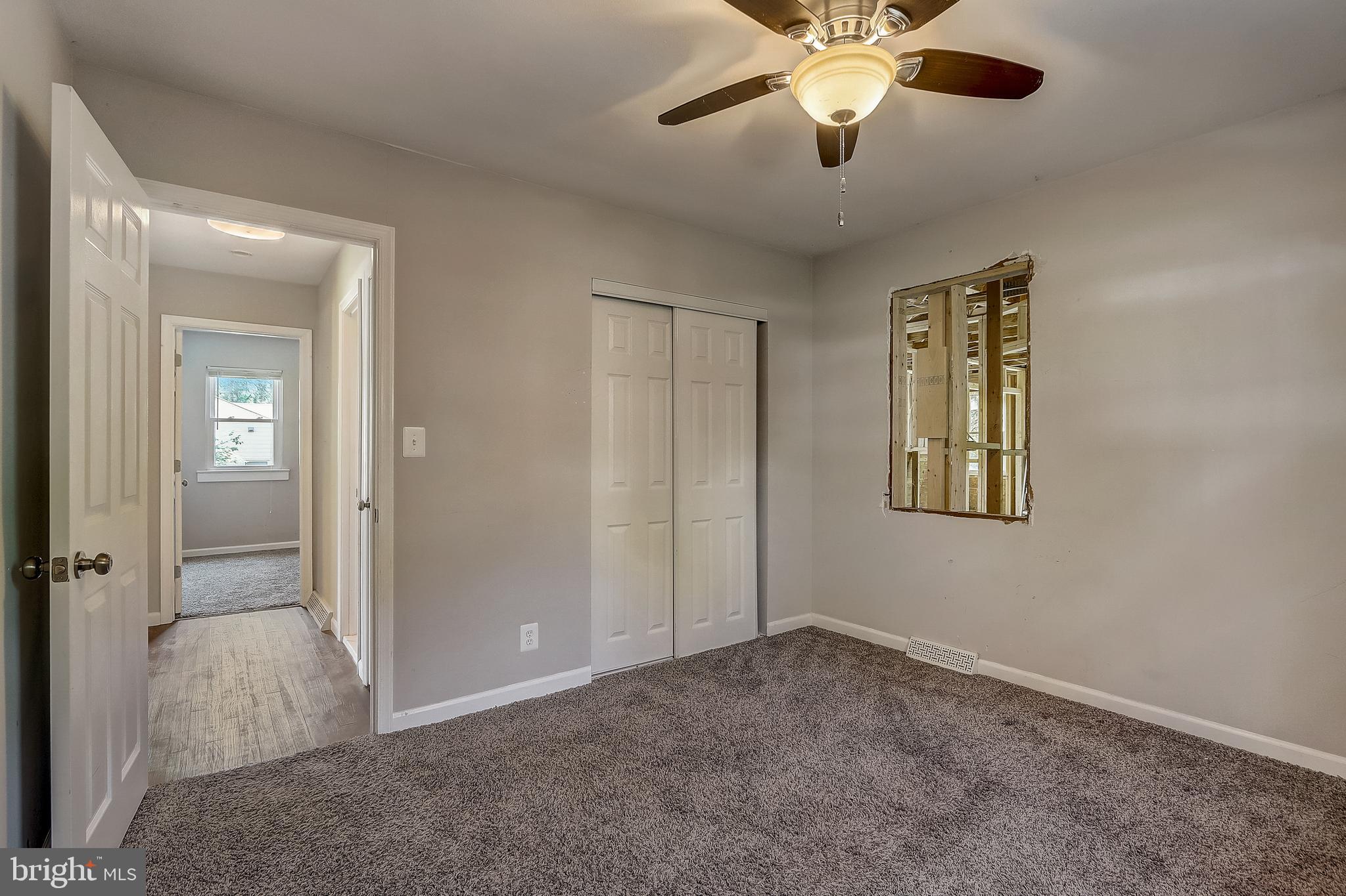 13221 Pine Road Bowie, MD 20720 - Photo 18 of 34 a view of an empty room with a window