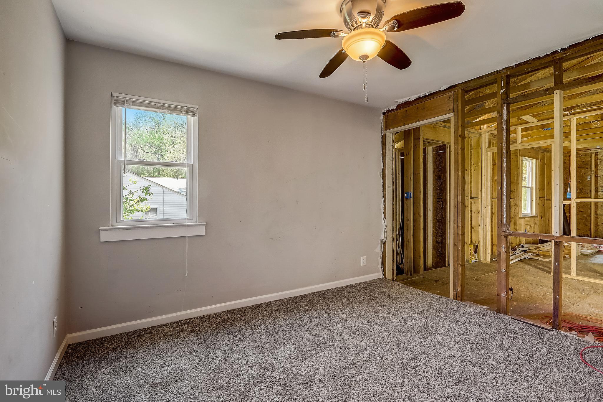 13221 Pine Road Bowie, MD 20720 - Photo 20 of 34 wooden floor in an empty room with a window
