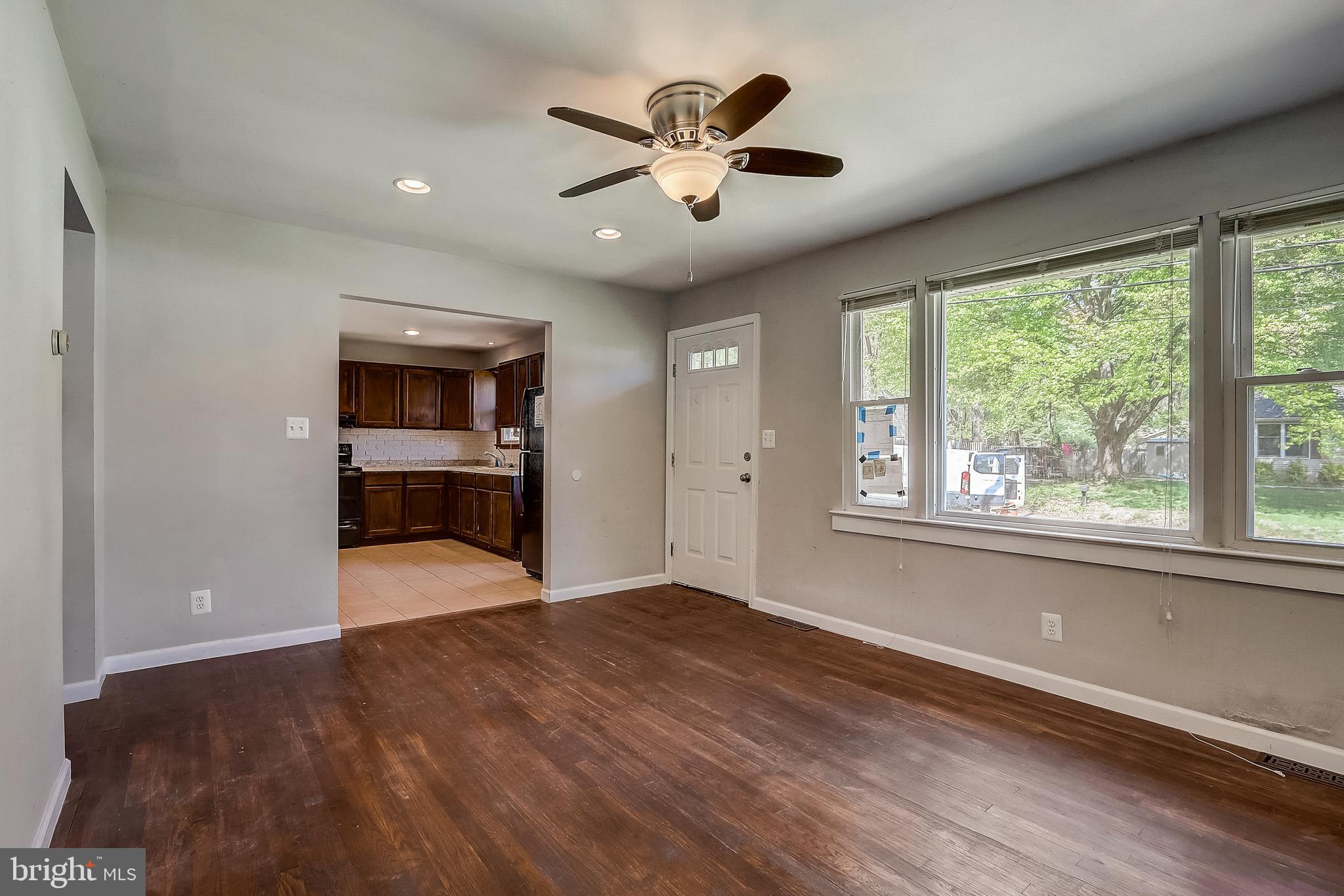 13221 Pine Road Bowie, MD 20720 - Photo 4 of 34 wooden floor in an empty room with a window