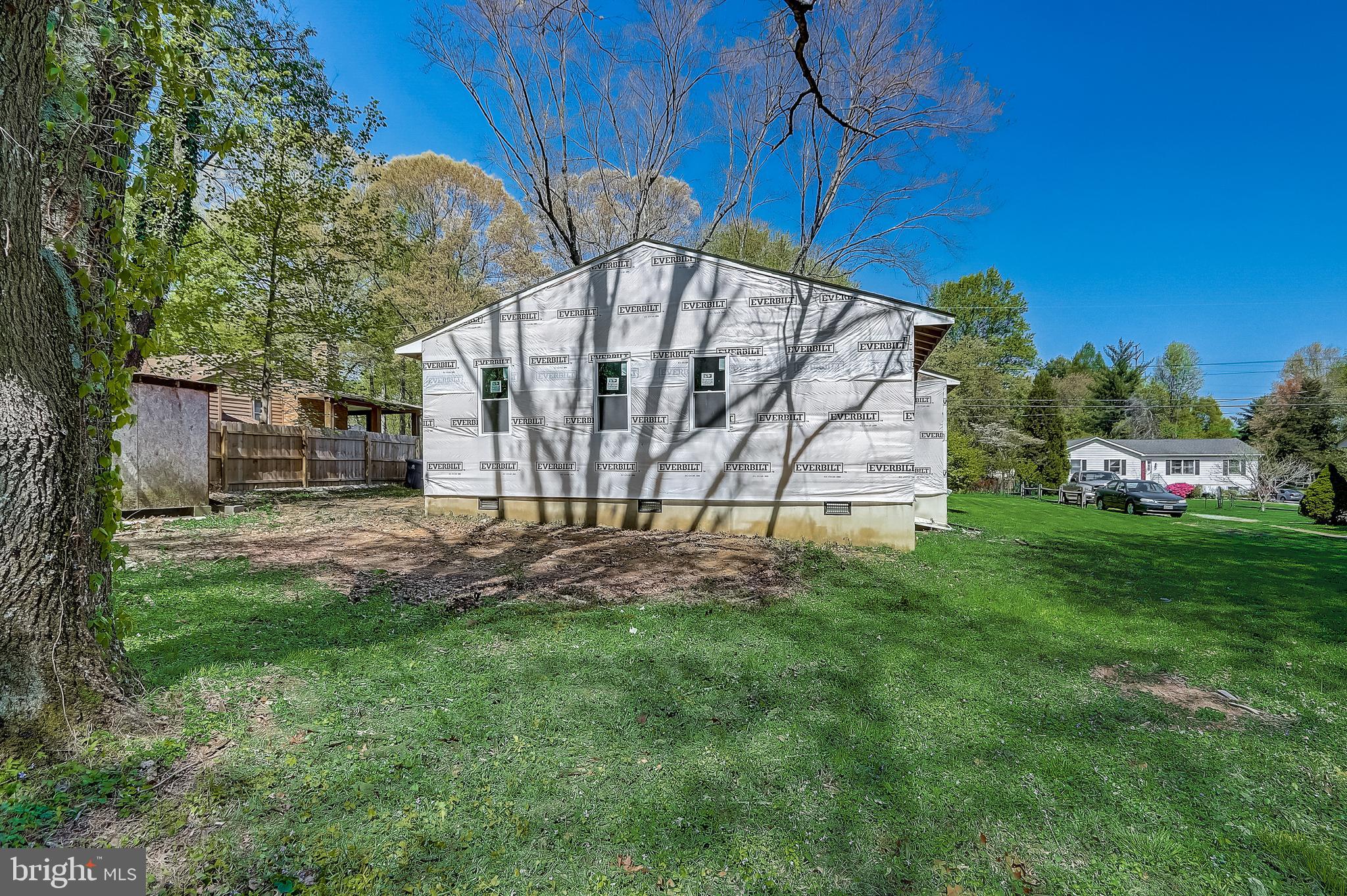 13221 Pine Road Bowie, MD 20720 - Photo 33 of 34 a view of a backyard with potted plants and large tree