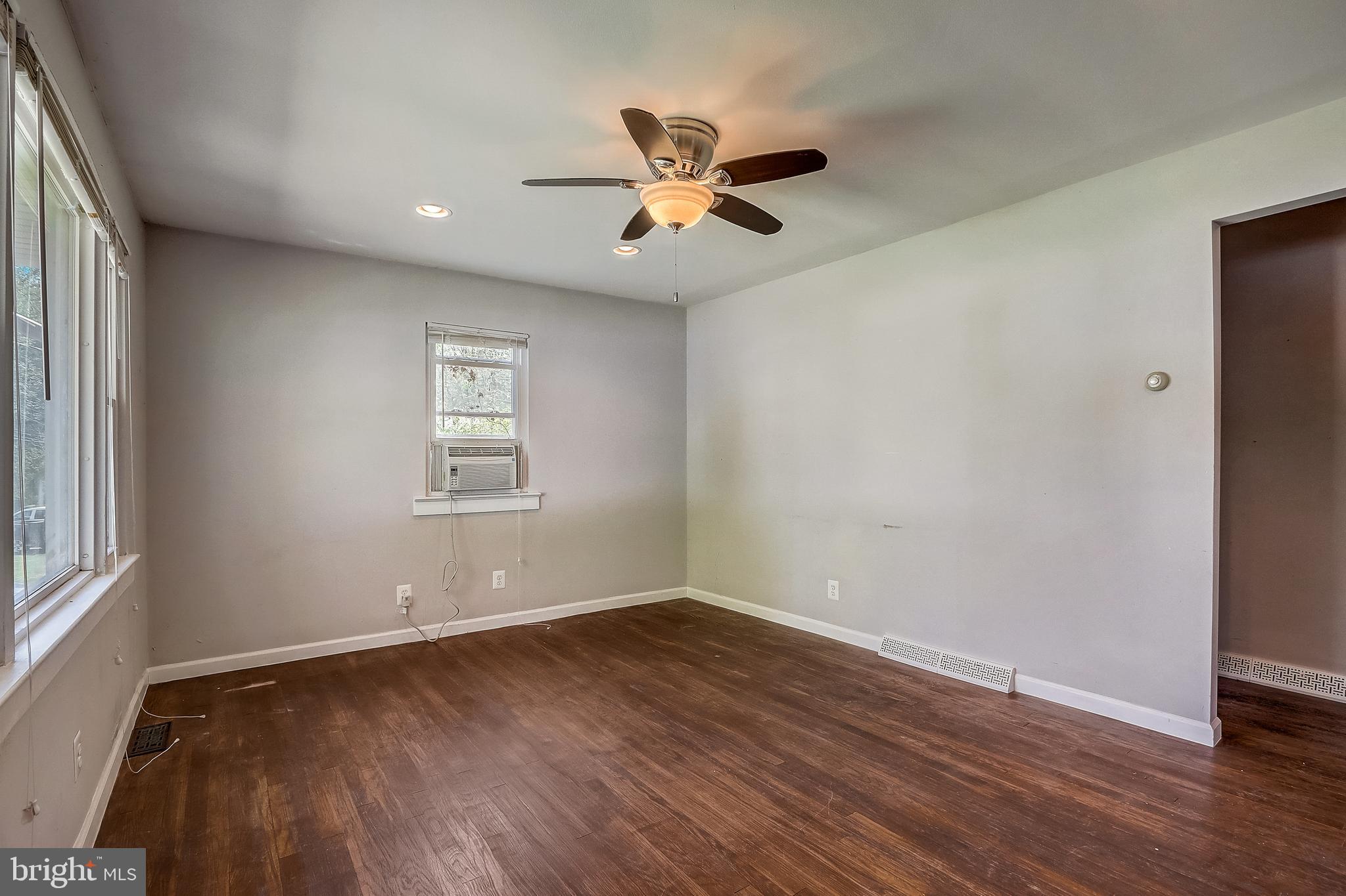 13221 Pine Road Bowie, MD 20720 - Photo 7 of 34 a view of empty room with wooden floor and fan