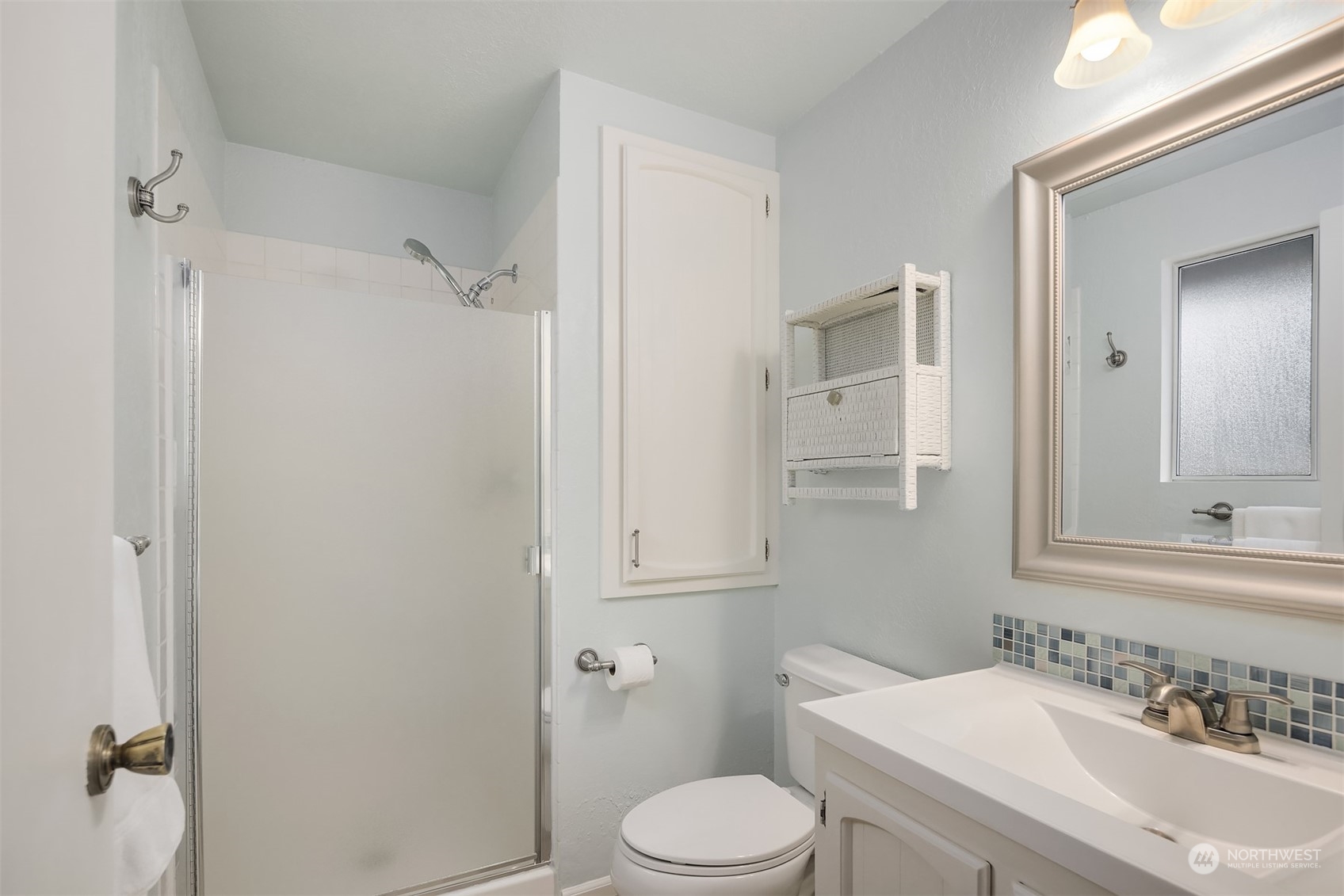 16604 3rd Avenue Southeast Bothell, WA 98012 - Photo 18 of 40 a bathroom with a sink toilet and shower
