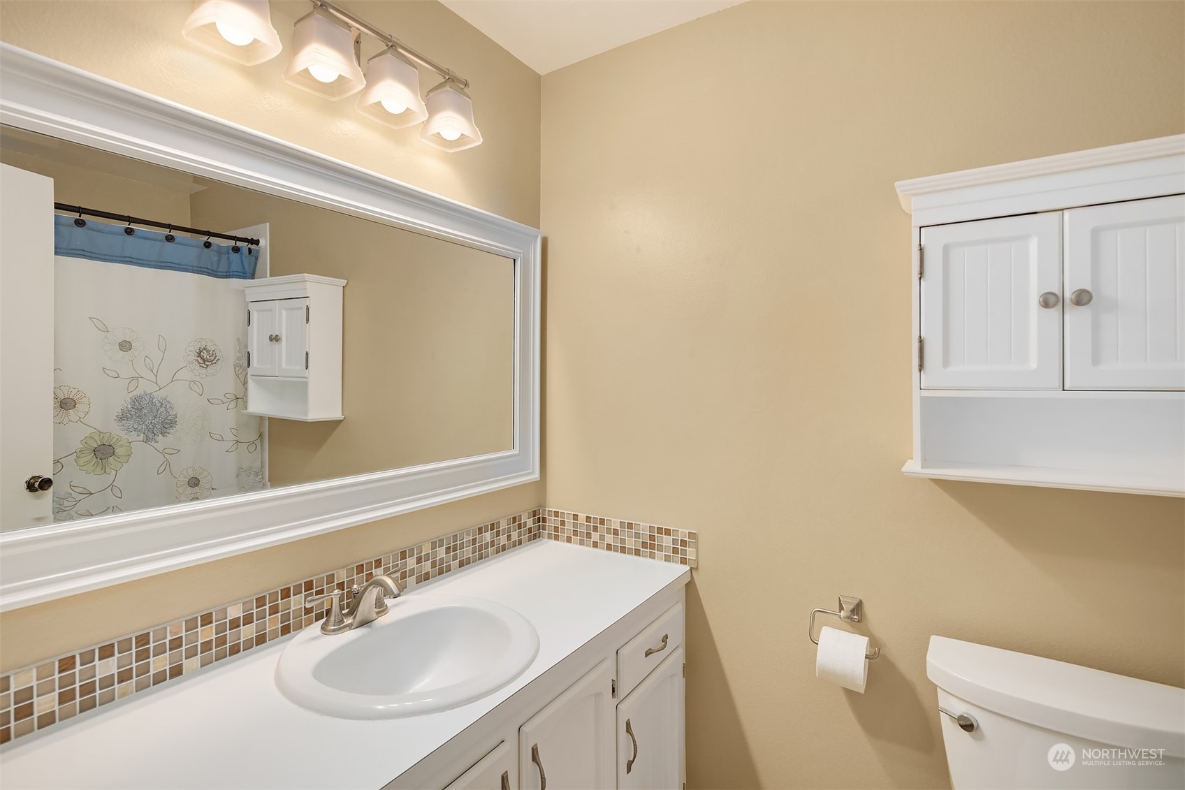 16604 3rd Avenue Southeast Bothell, WA 98012 - Photo 21 of 40 a bathroom with a sink a toilet and shower