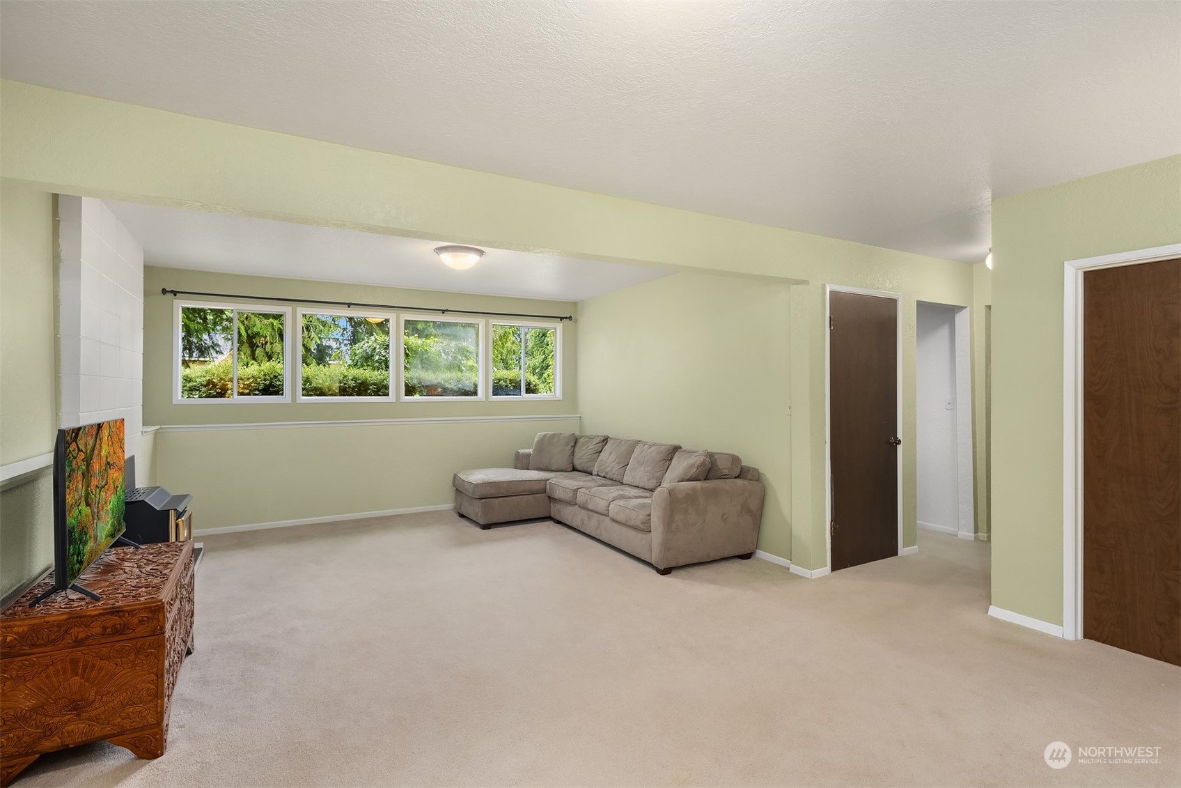 16604 3rd Avenue Southeast Bothell, WA 98012 - Photo 22 of 40 a living room with furniture and a window