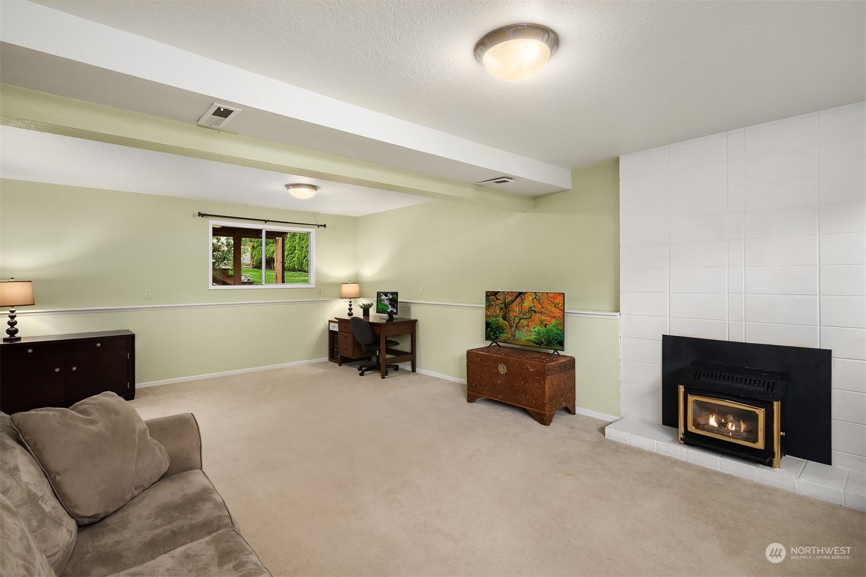 16604 3rd Avenue Southeast Bothell, WA 98012 - Photo 25 of 40 a bed room with furniture and a fireplace