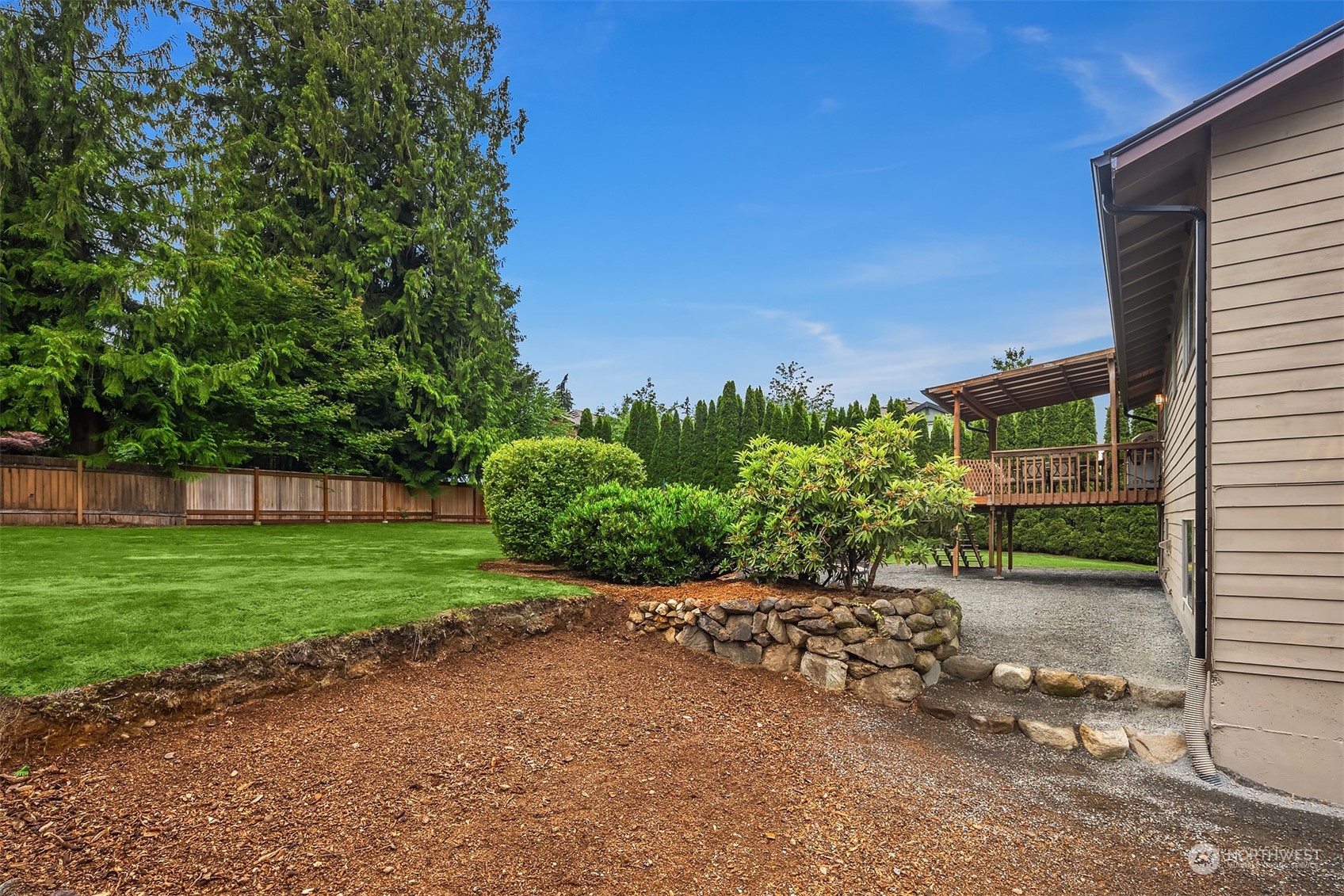 16604 3rd Avenue Southeast Bothell, WA 98012 - Photo 33 of 40 a view of a garden with a large tree
