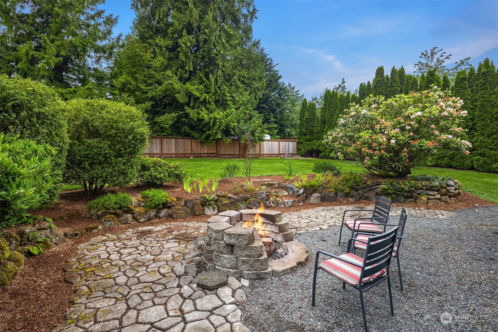 16604 3rd Avenue Southeast Bothell, WA 98012 - Photo 34 of 40 a view of a backyard with sitting area