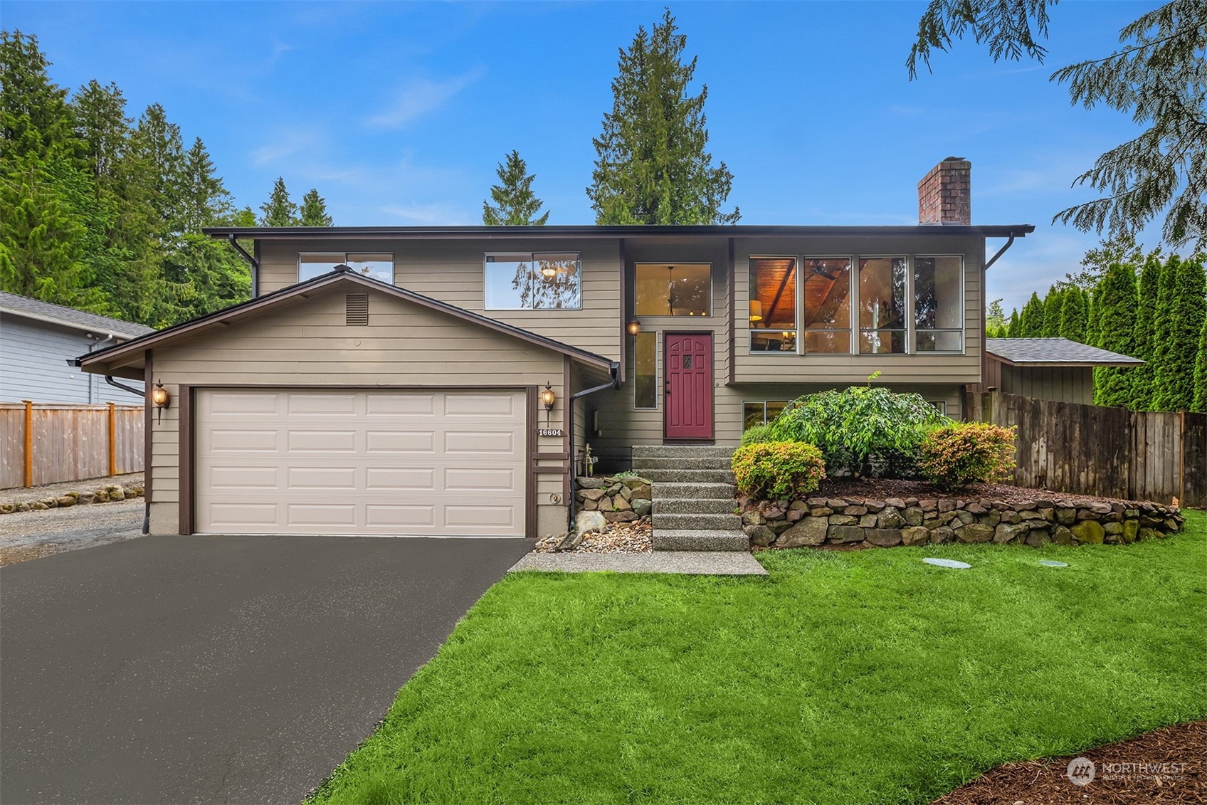 16604 3rd Avenue Southeast Bothell, WA 98012 - Photo 4 of 40 a view of a house with a yard and potted plants