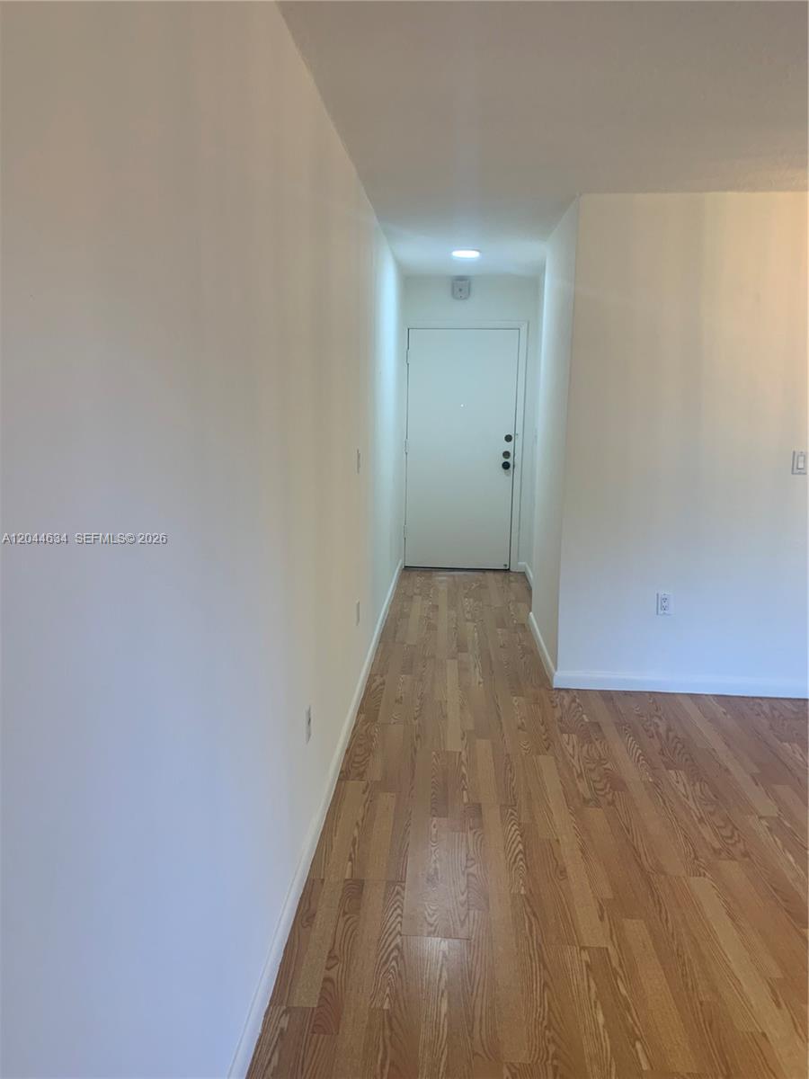 2460 Southwest 18th Avenue, Unit 1205 Miami, FL 33133 - Photo 2 of 21 a view of a hallway