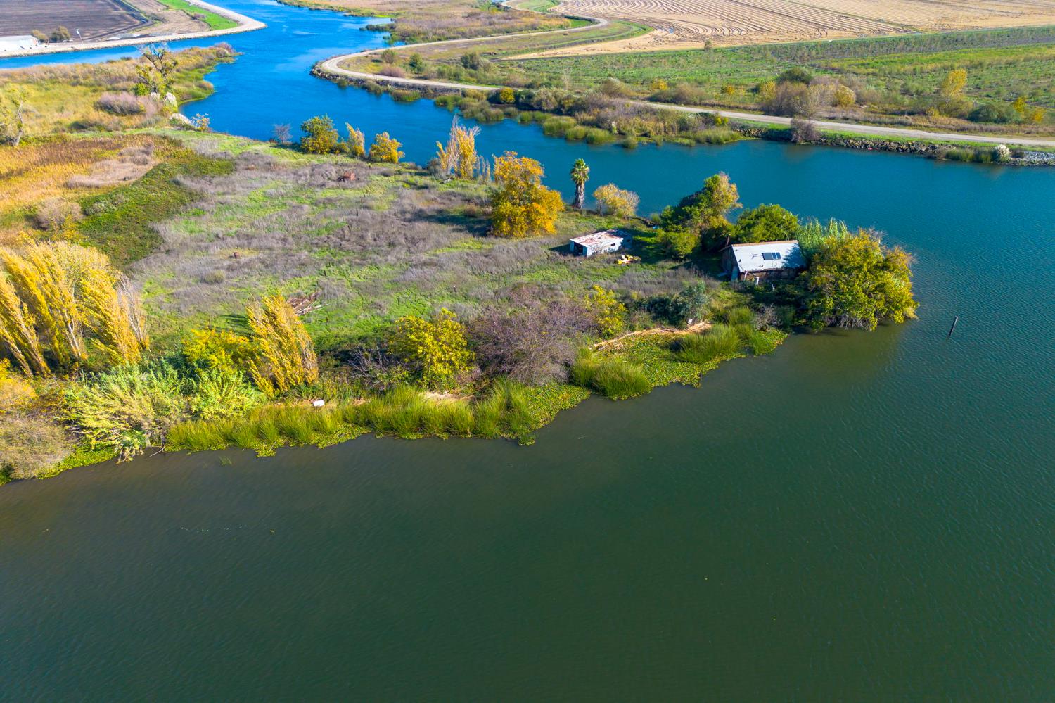 999511 West Rindge Road Stockton, CA 95219 - Photo 4 of 23 a lake with a mountain view
