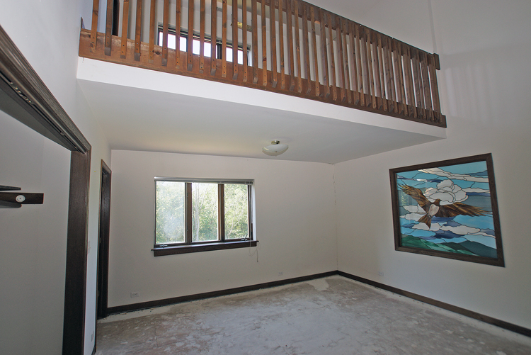 19411 Collins Road Marengo, IL 60152 - Photo 30 of 39 a view of an empty room with windows