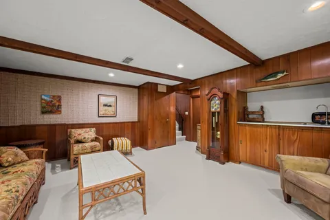 a bedroom with furniture and a couch