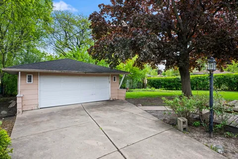a backyard of a house with lots of green space