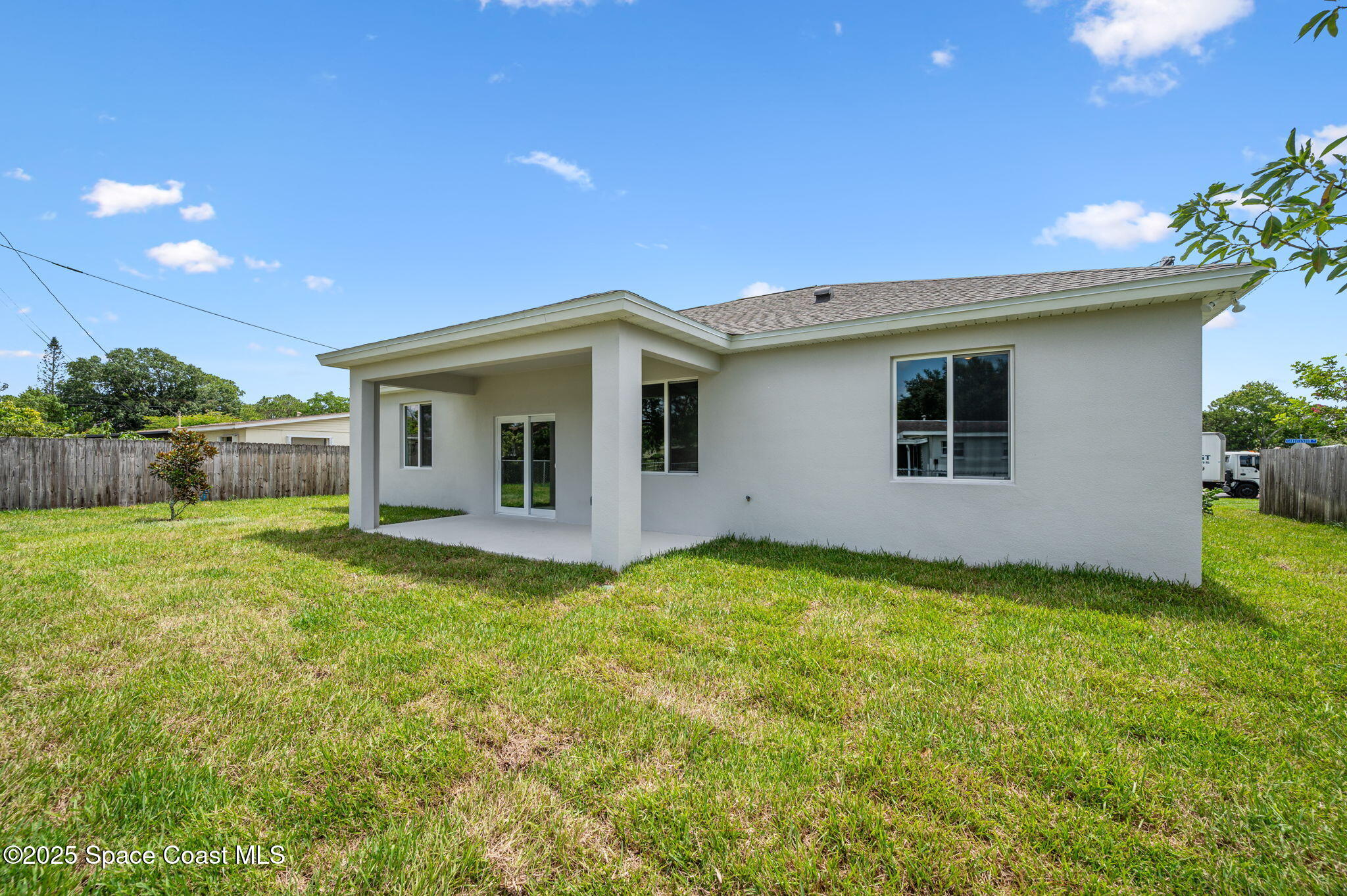 1107 Conquistador Drive Rockledge, FL 32955 - Photo 3 of 14 a view of a house with backyard and garden