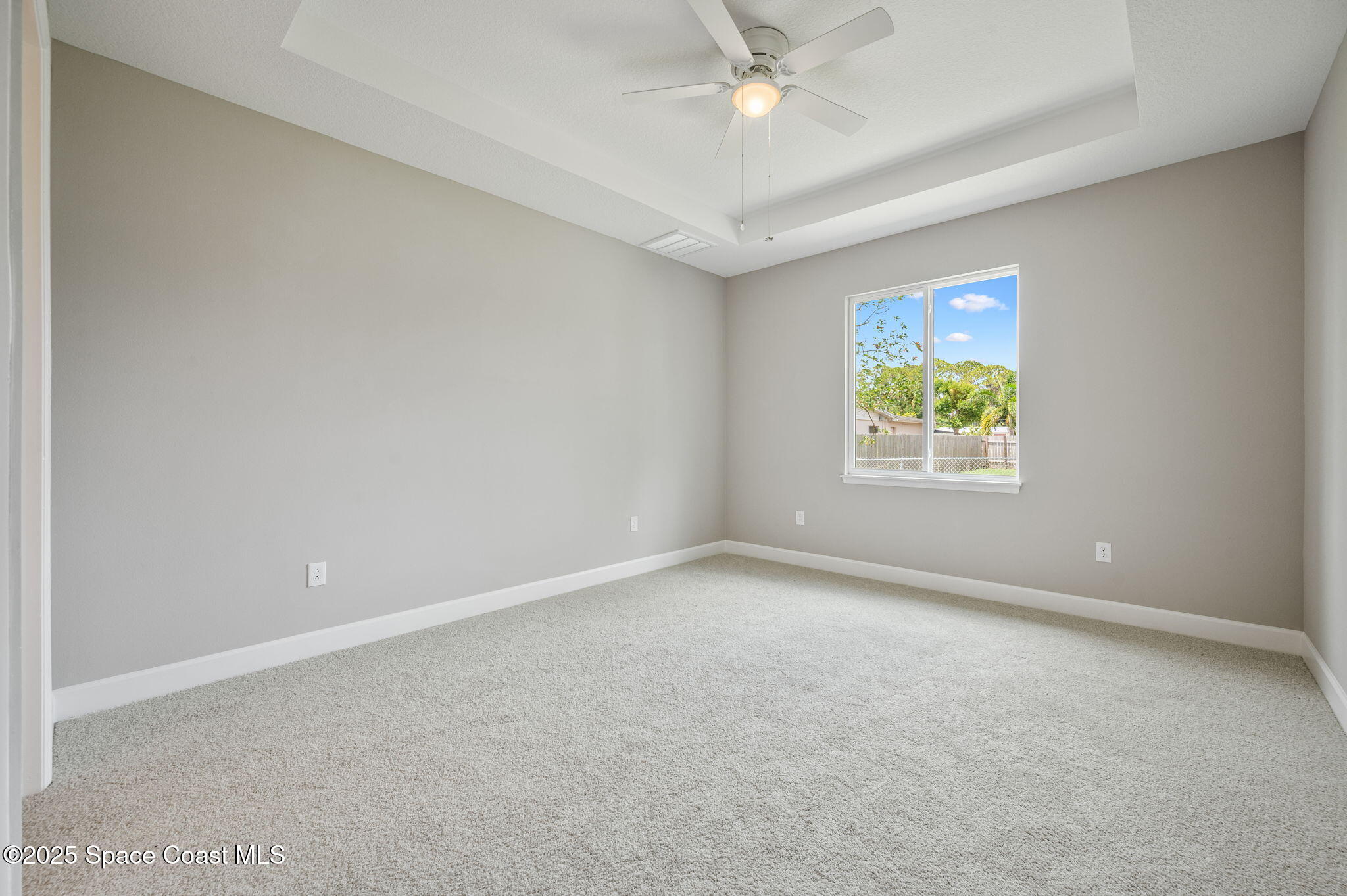 1107 Conquistador Drive Rockledge, FL 32955 - Photo 7 of 14 an empty room with a window