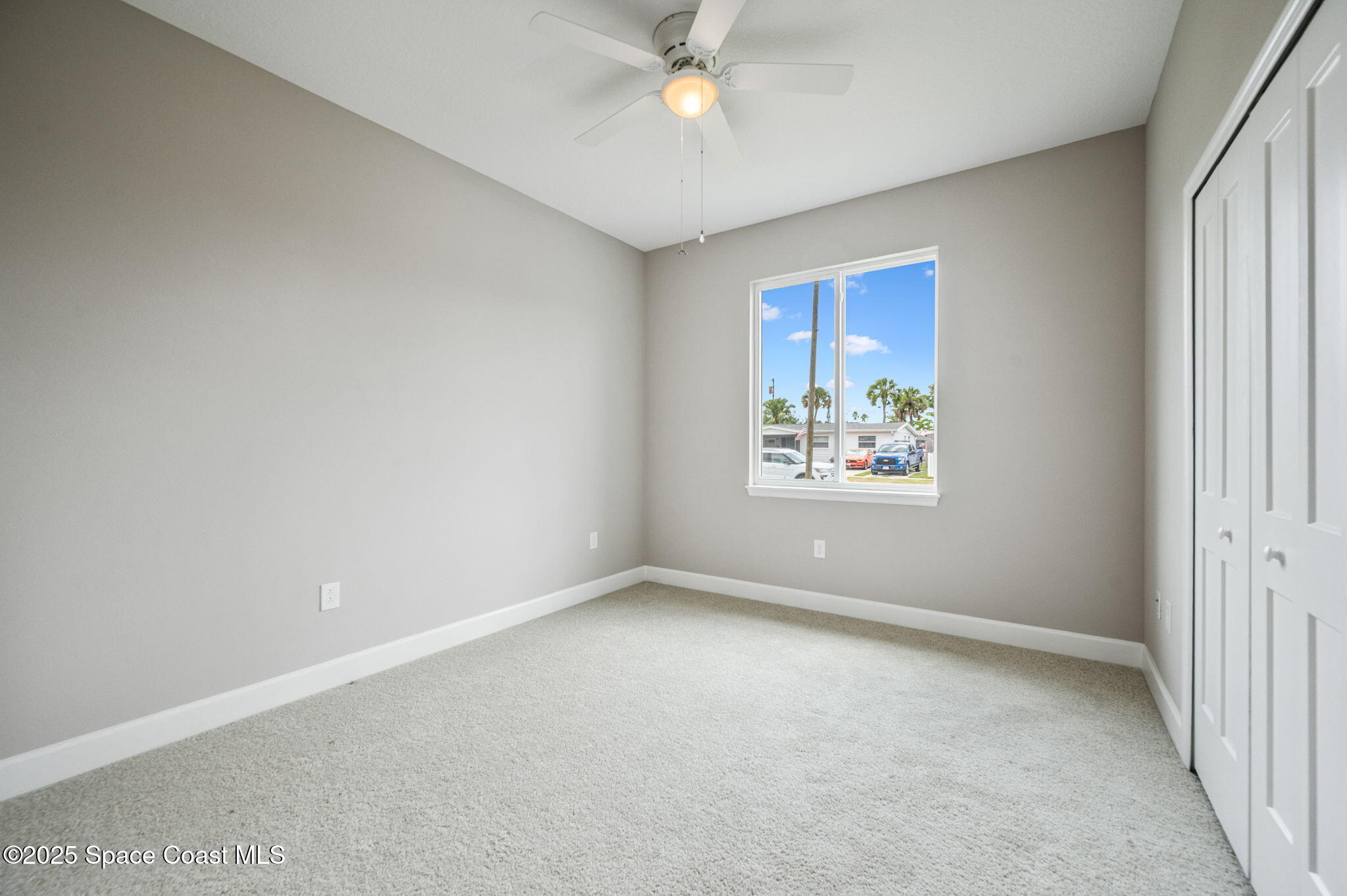 1107 Conquistador Drive Rockledge, FL 32955 - Photo 10 of 14 an empty room with a window