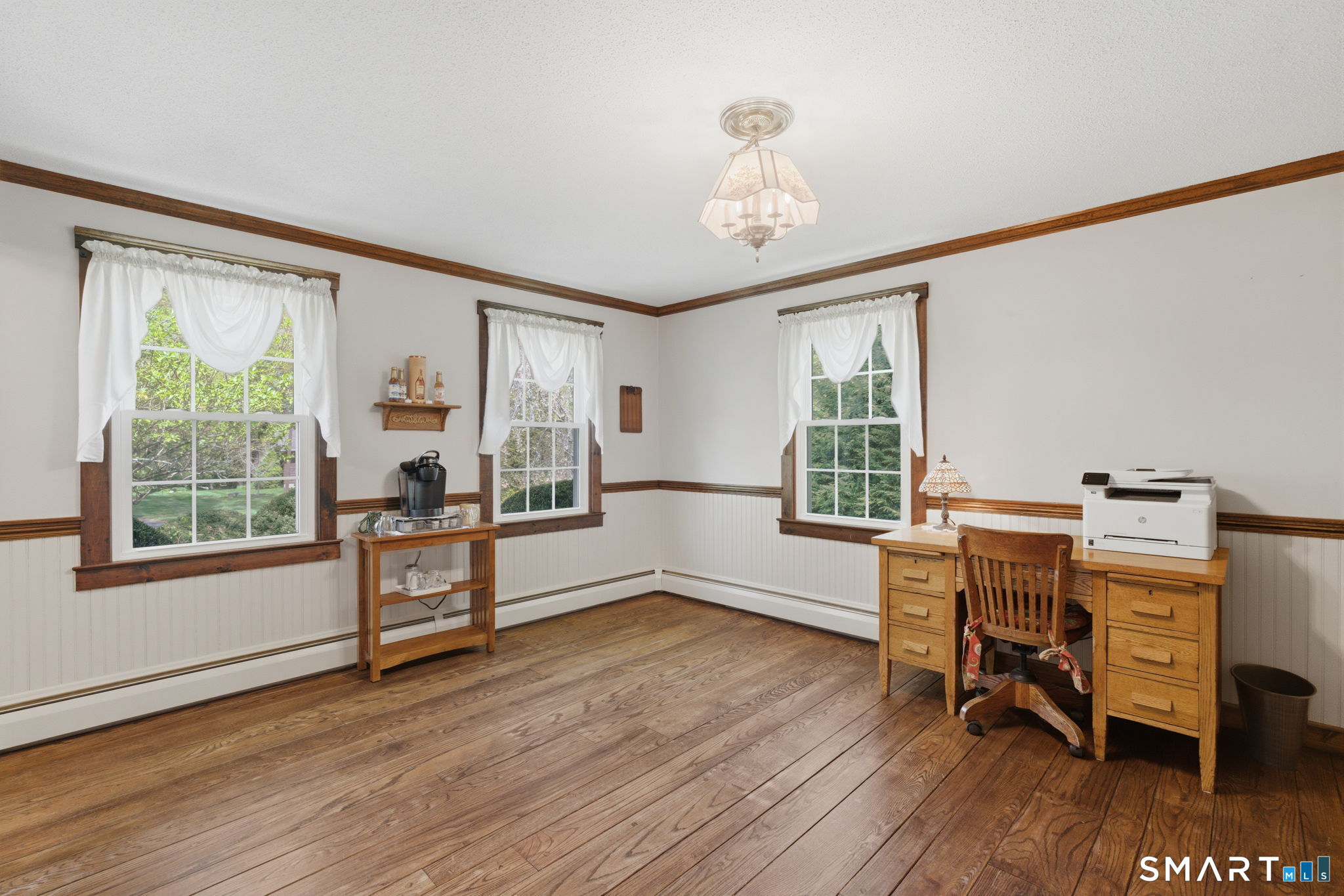 79 Buckboard Lane Bristol, CT 06010 - Photo 20 of 40 a workspace with furniture window and wooden floor