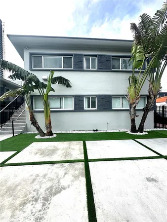a house view with a outdoor space