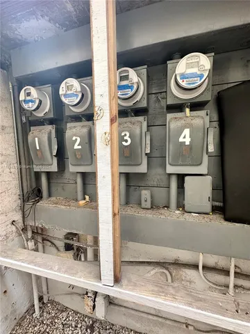 a kitchen with stainless steel appliances granite countertop a refrigerator a stove top oven a sink and dishwasher