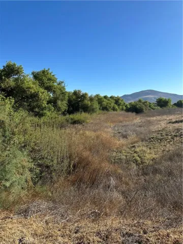 a view of mountain with lake view