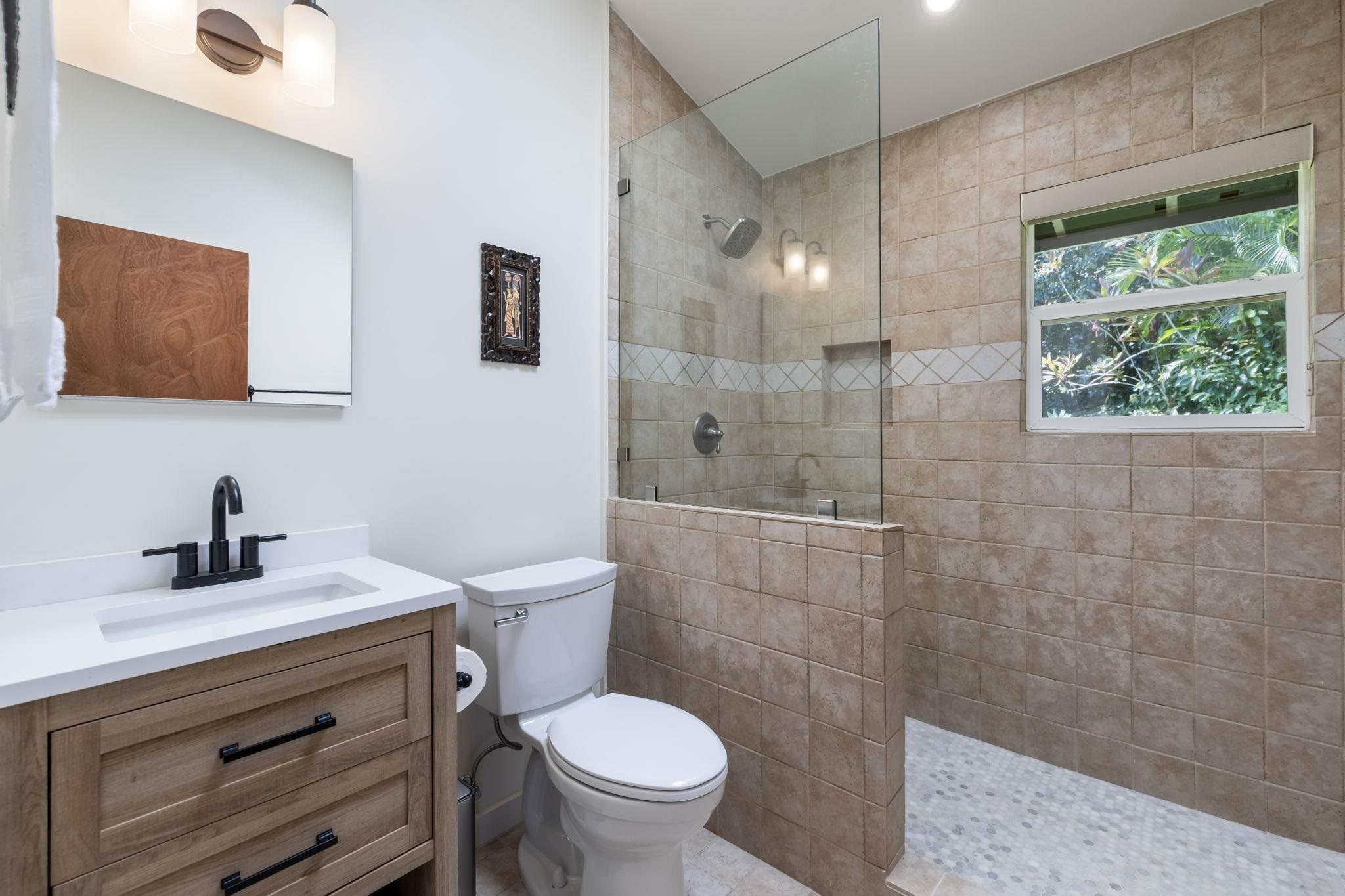153 West Waipio Road Haiku, HI 96708 - Photo 11 of 15 a bathroom with a sink toilet and shower