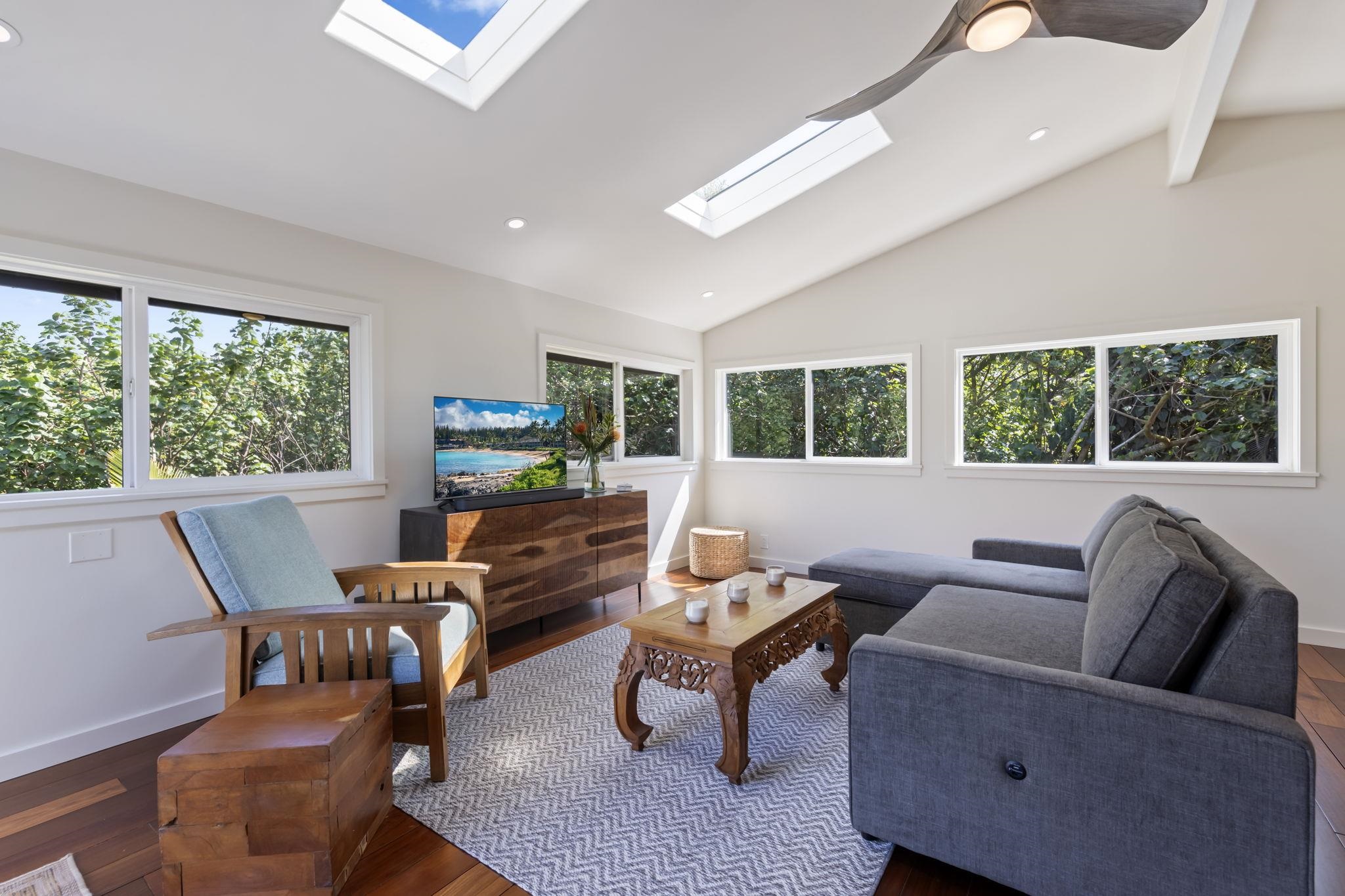 153 West Waipio Road Haiku, HI 96708 - Photo 2 of 15 a living room with furniture and a window