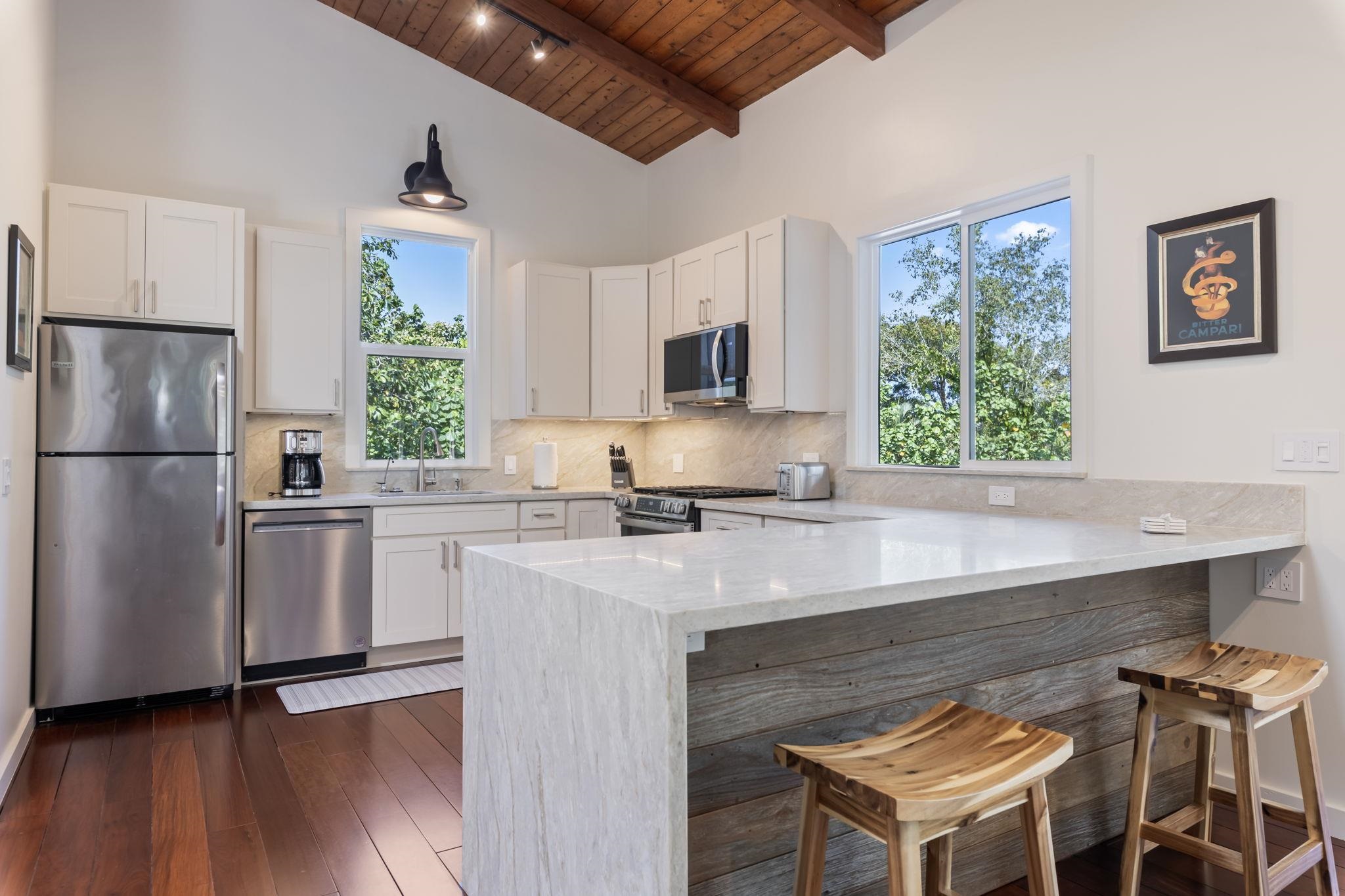 153 West Waipio Road Haiku, HI 96708 - Photo 5 of 15 a kitchen with appliances cabinets and a sink