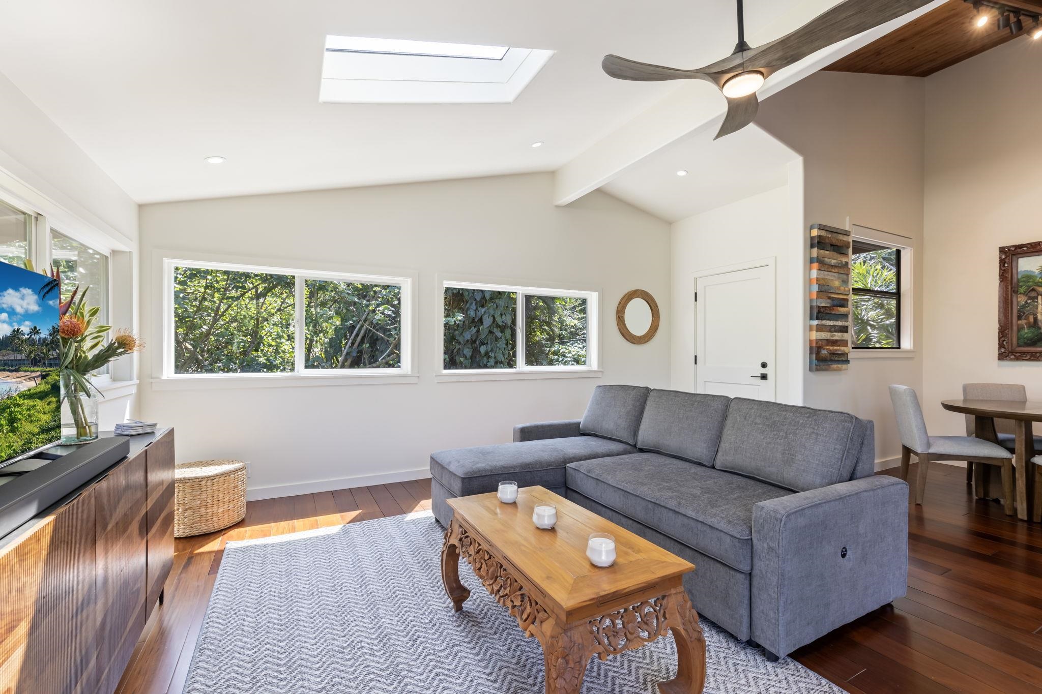 153 West Waipio Road Haiku, HI 96708 - Photo 7 of 15 a living room with furniture and a window