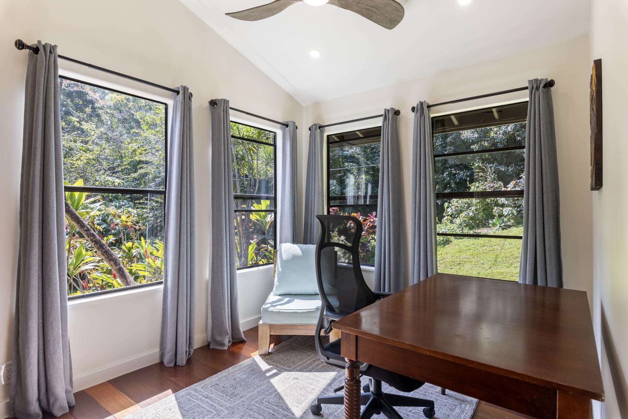 153 West Waipio Road Haiku, HI 96708 - Photo 9 of 15 a view of a workspace with furniture and a window