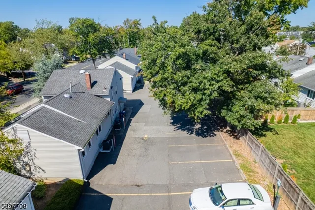 an aerial view of a house with outdoor space