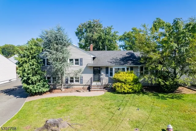 a house with garden in front of it