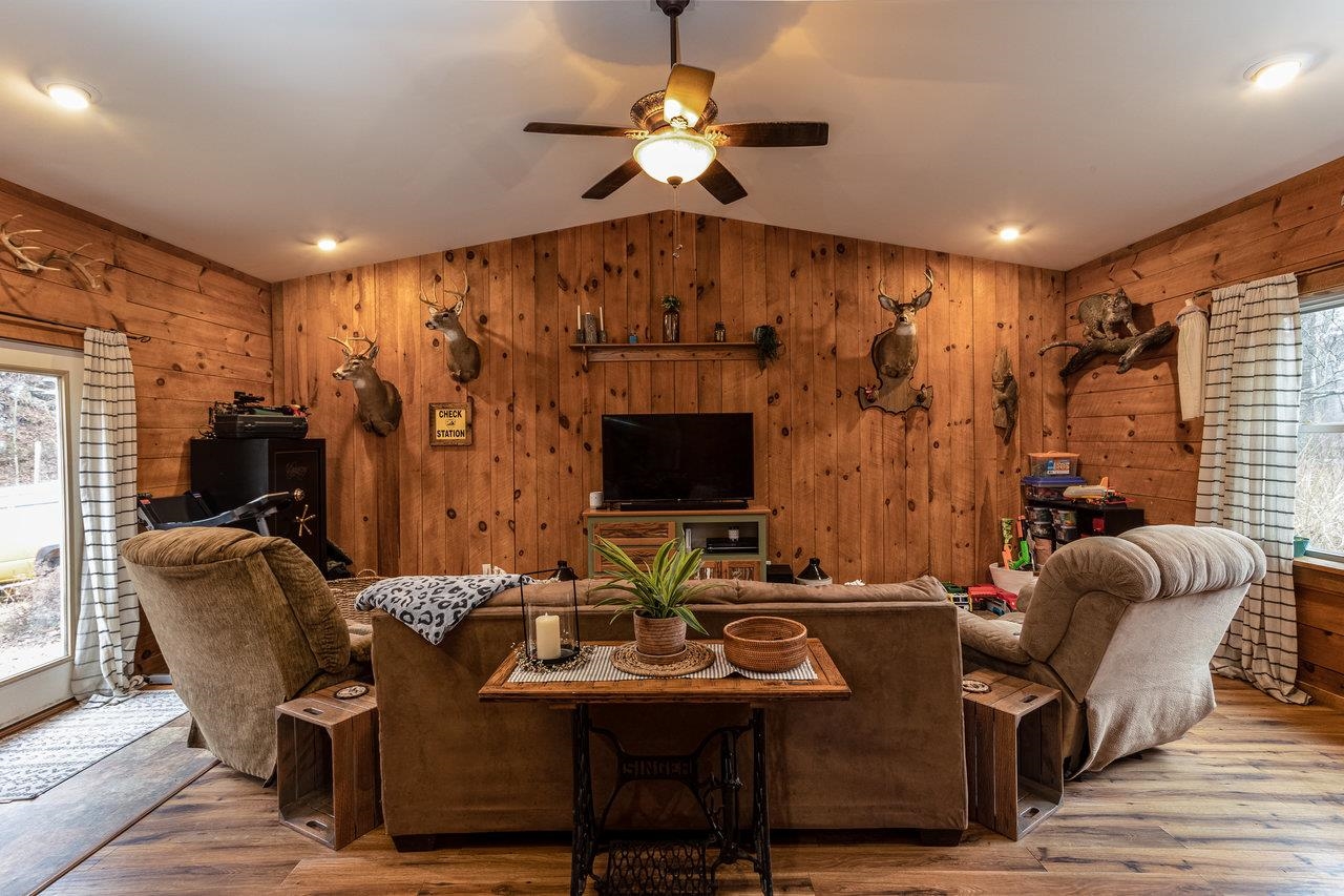 8448 Briery Branch Road Dayton, VA 22821 - Photo 14 of 37 a view of a livingroom with furniture and a ceiling fan